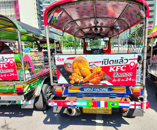 Bangkok tuk tuk campaign in KFC colors